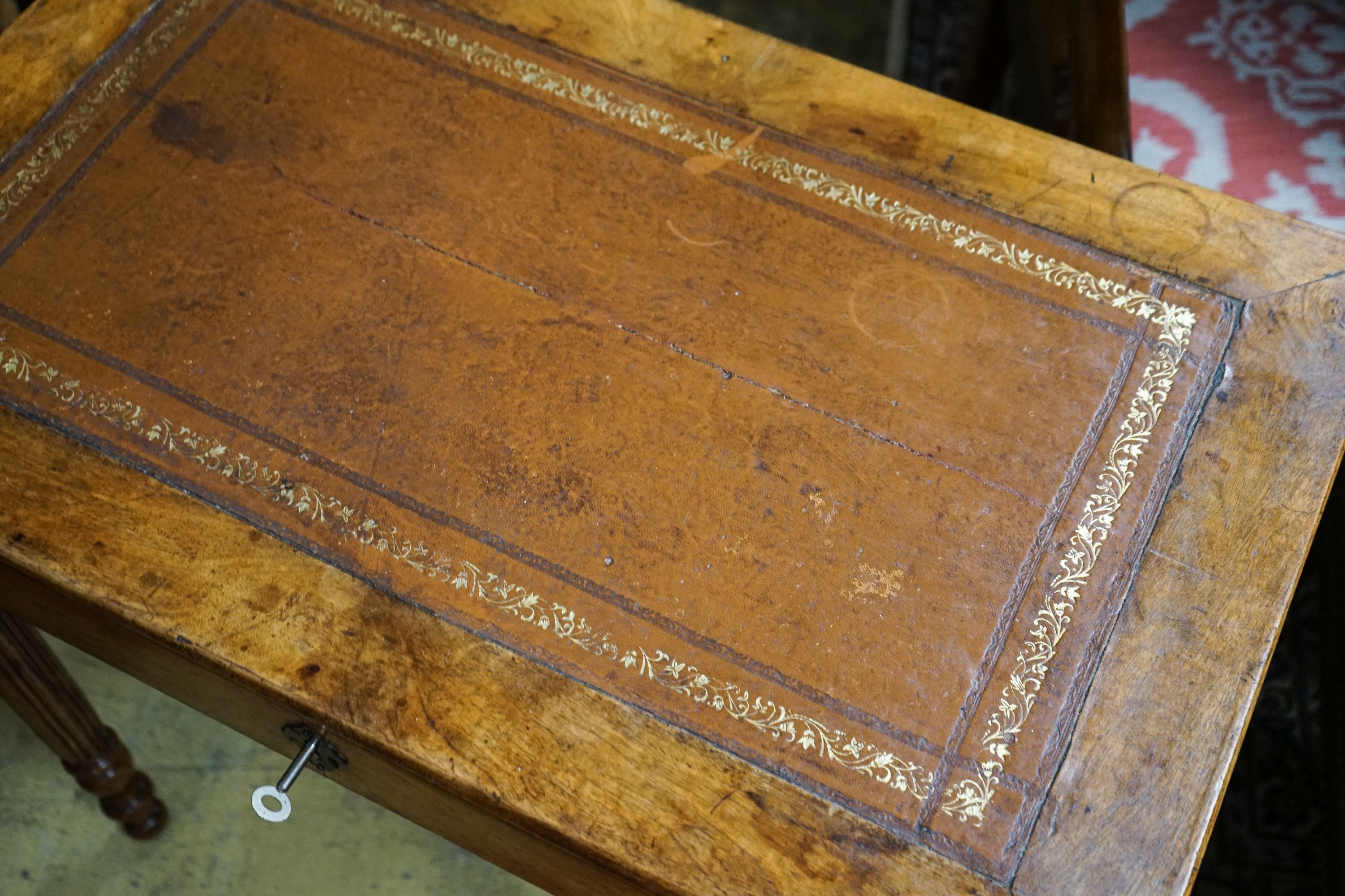 A 19th century French walnut single drawer writing table, width 80cm, depth 49cm, height 76cm